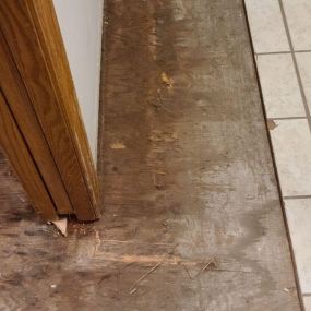 Pictured here is Minneapolis water damage in a kitchen.  As this picture shows, we are in the process of replacing the subflooring and tiled floors.