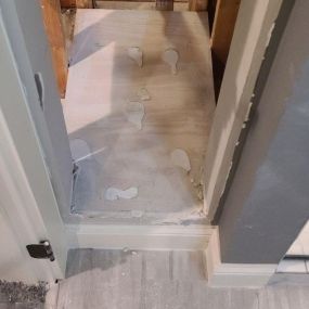 Pictured here is Minneapolis water damage in a laundry room.  As this picture shows, we replaced the subflooring after we completed the mold mitigation protocols.