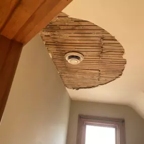 Water Damaged Plaster Over Wood Slate Ceiling.