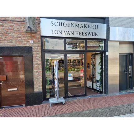 Logótipo de Schoenmakerij van Heeswijk