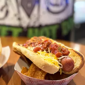 The Diablo Dog: Grilled Dog, Toasted Bun, Salsa, Shredded Cheese, Bacon Bits