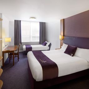 Premier Inn twin room with double bed and single sofa bed