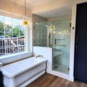 master bathroom remodel, free standing square tub, walk in shower, new wood flooring, custom light fixture