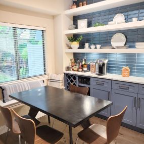 kitchen remodel, floating shelves, blue subway tile, window nook seating