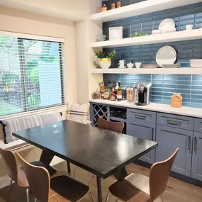 kitchen remodel, floating shelves, blue subway tile, window nook seating