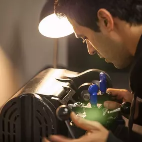 A simple photo of a locksmith at work.