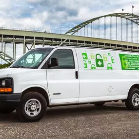 Our company van parked by Fremont Bridge.