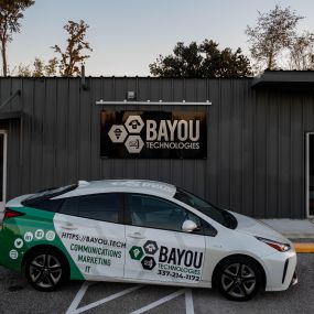 Bayou Technologies Building with Company Car