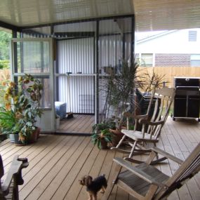 New Stained Deck with Greenhouse and Patio Cover