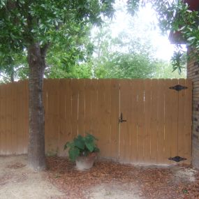 Stained 6ft. Stocade Privacy Fence