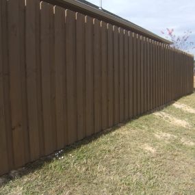 Stained 6ft. Board on Board Privacy Fence