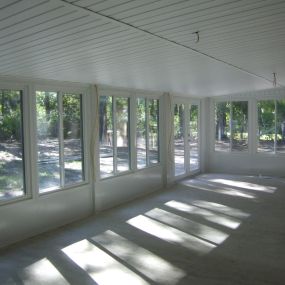 Sun  Room  with  Energy Efficient Insulated  LowE Full View French Doors and  Horizontal Sliding Vinyl Windows