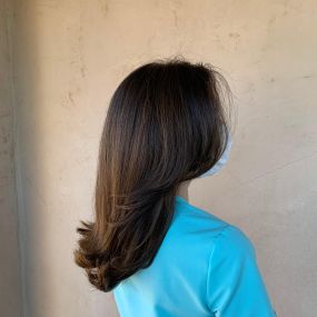 Deluxe Blowout, Midlength Haircut, Blow Dried Style, Smooth Shiny Hair, at Uniquely Elegant Hair Salon in Albuquerque Abq