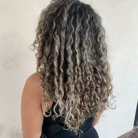 Long Thick Curly Hair, Cool Tone Balayage, at Uniquely Elegant Hair Salon in Albuquerque Abq