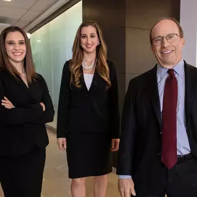 Attorneys Peter Greenspun, Anastasia Kranias, and Liza Greenspun Yang