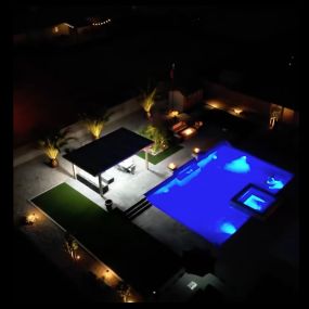 Aerial view of custom pool and spa with outdoor living environment