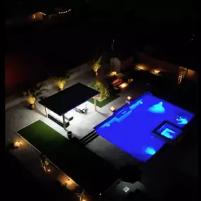 Aerial view of custom pool and spa with outdoor living environment