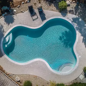 freeform pool design in California, aerial view