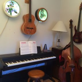 Music Studio,
Piano, Guitar, Electric Bass, Upright Bass.