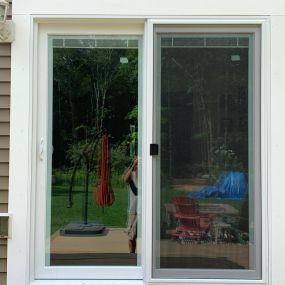 Completed Job in Newton, NJ. A single exterior door was removed and replaced with a Harvey Classic Series Sliding Glass Door with Blinds in between the glass.
