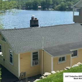 Completed Job in Byram Twp, NJ. This cute little lake house was completed with GAF Timberline HDZ - Charcoal Shingles. Both flat roofs in front and back of the house were re-done with Mule-hide Mod Bit in Black.