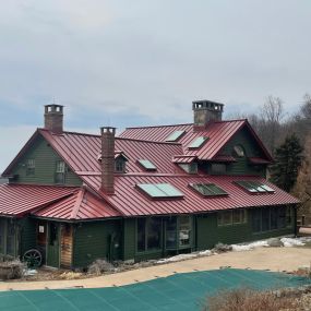 Completed Job in Hardwick, NJ. This roof was completed in 1/2in Snap Lock Metal - Colonial Red. This job was very detailed with the crew doing a great job making this project come out awesome!
