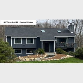 Completed Job in Andover, NJ. GAF Timberline HDZ - Charcoal shingles were applied to this home. A Velux skylight and 6