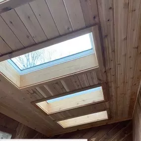 Completed Job in Lafayette, NJ. We installed new skylights bringing this room much needed natural light. Along with trimming out the skylights & installing 1x6 tongue & groove cedar to the whole ceiling.