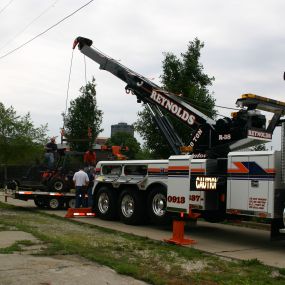 Reynolds Towing Service: We can handle ALL of your towing & roadside assistance needs from recovery tows to large equipment hauling – near and far.  Since 1980 we have been providing professional towing and recovery service to Central Illinois. Light, Medium, & Heavy Duty Towing | Transport | Emergency Recovery | Road assistance | Heavy Duty Rollovers | Equipment Hauling