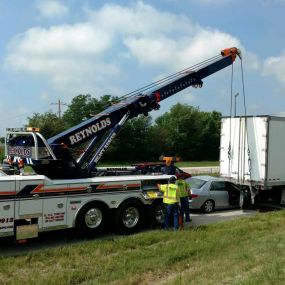 Reynolds Towing Service: We can handle ALL of your towing & roadside assistance needs from recovery tows to large equipment hauling – near and far.  Since 1980 we have been providing professional towing and recovery service to Central Illinois. Light, Medium, & Heavy Duty Towing | Transport | Emergency Recovery | Road assistance | Heavy Duty Rollovers | Equipment Hauling