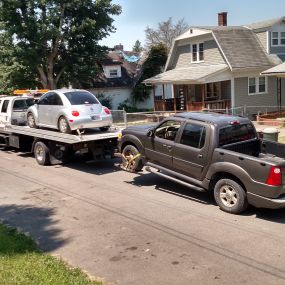 Can haul dually quad cab trucks or two at one time as seen 
SPECIAL RATES FOR TOWING WITH REPAIRS.
Give us a chance will save u money