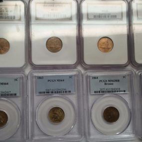 A sampling of the high grade slabbed pennies, both Lincoln and Indian cents.