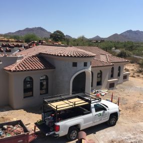 Installing a new tile roof on a beautiful home in Scottsdale.