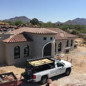 Installing a new tile roof on a beautiful home in Scottsdale.