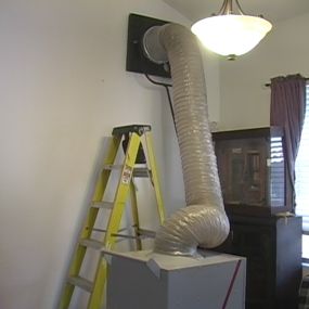 HEPA vacuum hooked up to air ducts system in Phoenix home.
