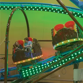 Throw your hands up and enjoy our indoor roller coaster!