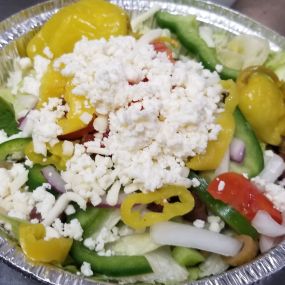 Greek Salad loaded with veggies, peppers and cheese!