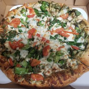 Fan Creation! A classic pesto chicken pizza with fresh sliced tomatoes and broccoli!