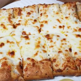 Cheesy Bread Sticks! Served with 2 sides of pizza sauce!
