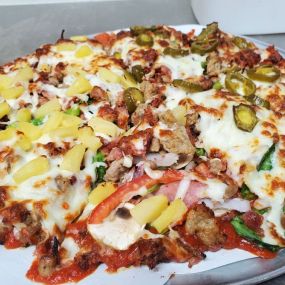 Pounder Omnivore pizza! Meat lover PLUS veggie lover AND jalapenos and pineapples!