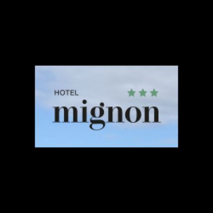 Logotipo de Hotel Mignon