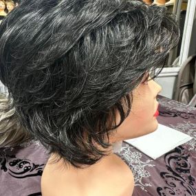 Wig of the Week: This striking salt and pepper wig color captures the natural arrival of silver strands: a dark base sprinkled with luminous white. Find this shade in more than 20 popular styles!