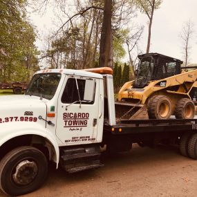 Need to tow some construction equipment? Our truck can handle large and small tows!