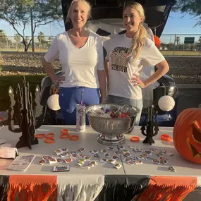 Agency Manager Courtney helping with the Eastmark trunk or treat