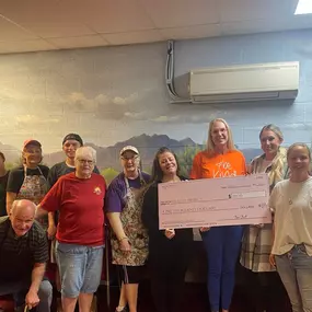 Presenting the Good Hands Grant to the Genesis Project in Apache Junction for $1000