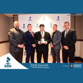 Our leadership team accepting the 2017 BBB Torch Award for Marketplace Ethics!