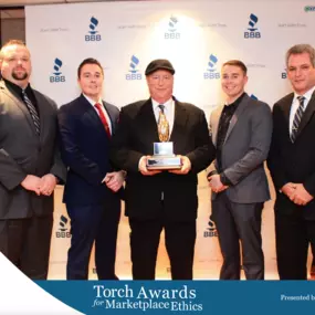 Our leadership team accepting the 2017 BBB Torch Award for Marketplace Ethics!