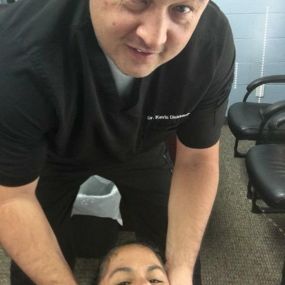 Helping a patient deal with neck pain.