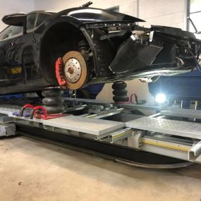 2013 Lamborghini Gallardo on the new Spanesi Rack. Clash of a crashed Italian sports car verses Italy’s state of the art bench / rack measuring system. This car was worked on before it reached our shop and obviously they couldn’t get the job done.