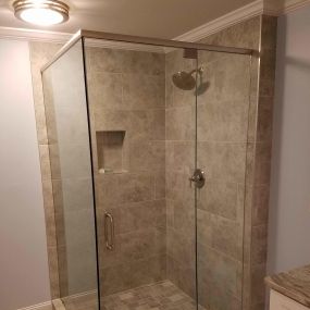 Looking to enhance the aesthetic of your bathroom? Try a frameless shower!